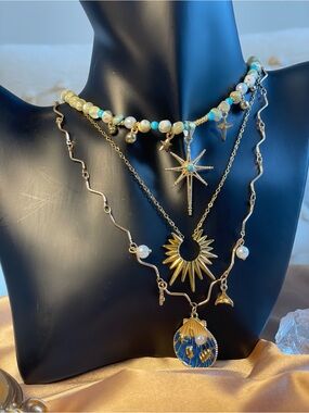 Gold Layered Sunburst and Star Necklace Set with Blue Accents